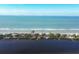 Aerial view of coastline with ocean and waterway at 1030 Phorus Rd Rd, Venice, FL 34293