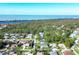 Aerial view of neighborhood with ocean views at 1030 Phorus Rd Rd, Venice, FL 34293