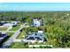 Aerial view of the house, showcasing its location near the ocean at 1030 Phorus Rd Rd, Venice, FL 34293