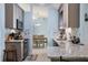 Bright kitchen with granite countertops and modern appliances at 1030 Phorus Rd Rd, Venice, FL 34293