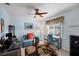 Home office with built-in desk and comfortable seating at 1030 Phorus Rd Rd, Venice, FL 34293