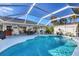 Large screened pool with spacious patio area at 1030 Phorus Rd Rd, Venice, FL 34293