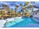 Screened pool and spa with ample deck space at 1030 Phorus Rd Rd, Venice, FL 34293