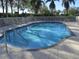 Inviting community pool with ample lounge chairs for relaxation at 106 Corte Del Asolo, Venice, FL 34285