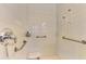 Walk-in shower with safety features at 1151 Creek Nine Dr, North Port, FL 34291