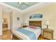 Main bedroom with ensuite bathroom access at 1151 Creek Nine Dr, North Port, FL 34291