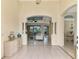 Spacious entryway offering views into the living and dining areas at 1151 Creek Nine Dr, North Port, FL 34291