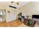 Bright home office features built-in shelving and wood desk at 1151 Creek Nine Dr, North Port, FL 34291