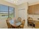Bright kitchen nook with built-in desk and view at 1151 Creek Nine Dr, North Port, FL 34291