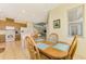 Kitchen with breakfast nook and view to living room at 1151 Creek Nine Dr, North Port, FL 34291