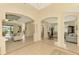 Open living room with high ceilings and access to other rooms at 1151 Creek Nine Dr, North Port, FL 34291