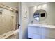 Bright bathroom with a toilet, shower/tub combo, and updated vanity at 1174 Bird Bay Way # 107, Venice, FL 34285