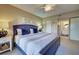 King-size bed and access to the bathroom at 1174 Bird Bay Way # 107, Venice, FL 34285