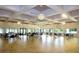 Spacious community room with tables and chairs at 1174 Bird Bay Way # 107, Venice, FL 34285