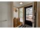 Condo entry with coat closet and view to patio at 1174 Bird Bay Way # 107, Venice, FL 34285