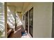 Condo entryway with bench and private entrance at 1174 Bird Bay Way # 107, Venice, FL 34285