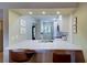 Kitchen features a breakfast bar with seating for two at 1174 Bird Bay Way # 107, Venice, FL 34285