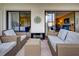 Spacious patio with wicker furniture, offering a comfortable outdoor living space at 1174 Bird Bay Way # 107, Venice, FL 34285