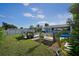 Spacious backyard with a pool and seating area at 126 Venice East Blvd, Venice, FL 34293