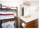 Bathroom with vanity, toilet and storage at 126 Venice East Blvd, Venice, FL 34293
