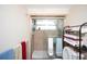 Clean bathroom with walk-in shower and storage at 126 Venice East Blvd, Venice, FL 34293