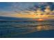 Peaceful beach sunset with birds on shore at 126 Venice East Blvd, Venice, FL 34293