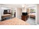Spacious bedroom with mirrored closet doors and a ceiling fan at 126 Venice East Blvd, Venice, FL 34293