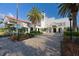 Venice City Hall, featuring a white building and landscaping at 126 Venice East Blvd, Venice, FL 34293
