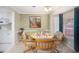 Dining area with table and chairs near kitchen at 126 Venice East Blvd, Venice, FL 34293