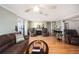 Spacious living room featuring hardwood floors and comfortable seating at 126 Venice East Blvd, Venice, FL 34293