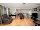 Bright living room with hardwood floors and ample natural light at 126 Venice East Blvd, Venice, FL 34293