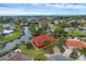 Waterfront property showcasing a beautiful home near the ocean at 135 Tina Island Dr, Osprey, FL 34229