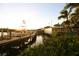 Scenic sunset view over the water and marina at 135 Tina Island Dr, Osprey, FL 34229