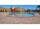 Resort-style pool with expansive deck and clubhouse at 20049 Benissimo Dr, Venice, FL 34293