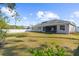 Large backyard with grassy area at 2425 De Vore St, North Port, FL 34291