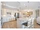 Spacious kitchen featuring granite countertops and stainless steel appliances at 25151 Spartina Dr, Venice, FL 34293