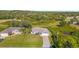 Aerial view of two houses on a lot at 4467 Cinderella Cir, North Port, FL 34286