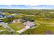 Aerial view of house and neighborhood at 4467 Cinderella Cir, North Port, FL 34286