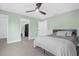 Bright bedroom with ensuite bathroom and walk-in closet at 4467 Cinderella Cir, North Port, FL 34286