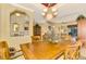 Bright dining room featuring a wood table and decorative accents at 5633 Whispering Oaks Dr, North Port, FL 34287