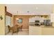 Well-equipped kitchen with stainless steel appliances, granite countertops and ample cabinet space at 5633 Whispering Oaks Dr, North Port, FL 34287