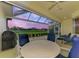 Relaxing covered patio overlooking a golf course at 5633 Whispering Oaks Dr, North Port, FL 34287