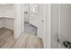 Bathroom with access to the closet with marble tile and modern fixtures at 606 Marcus St # 26, Venice, FL 34285