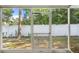 View from screened porch to backyard at 606 Marcus St # 26, Venice, FL 34285