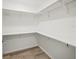 Spacious walk-in closet with ample shelving and hanging space at 606 Marcus St # 26, Venice, FL 34285