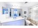 Bathroom with white vanity, glass shower, and toilet at 612 Bird Bay S Dr # 114, Venice, FL 34285