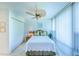 Bedroom with white bedding, and built-in wardrobe at 612 Bird Bay S Dr # 114, Venice, FL 34285