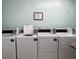 Shared laundry facility with multiple washers and dryers at 612 Bird Bay S Dr # 114, Venice, FL 34285