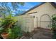 Private backyard with wooden fence and patio at 6906 Woodwind Dr # 12, Sarasota, FL 34231