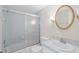 Bathroom with tub, shower, and updated vanity at 6906 Woodwind Dr # 12, Sarasota, FL 34231
